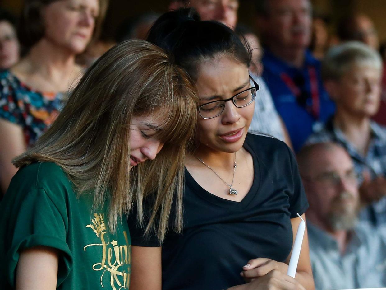 Friends of a high school student among the seven killed in a Texas mass shooting gathered to mourn: AP