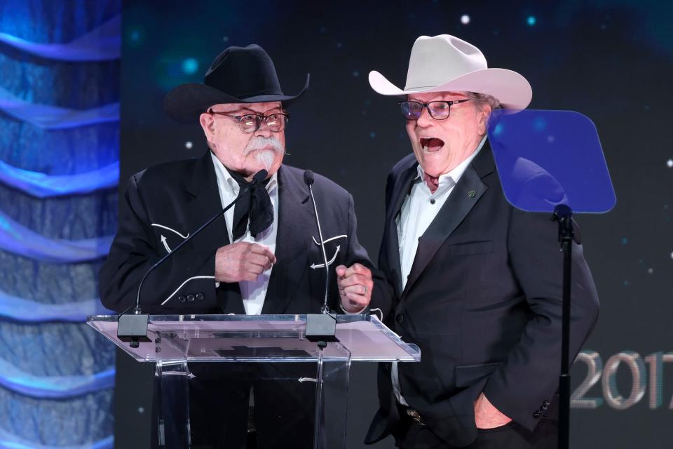 Barry Corbin, left, and Patrick Wayne present an award during the 2023 Western Heritage Awards at the National Cowboy & Western Heritage Museum in Oklahoma City, Saturday, April 15, 2023. 