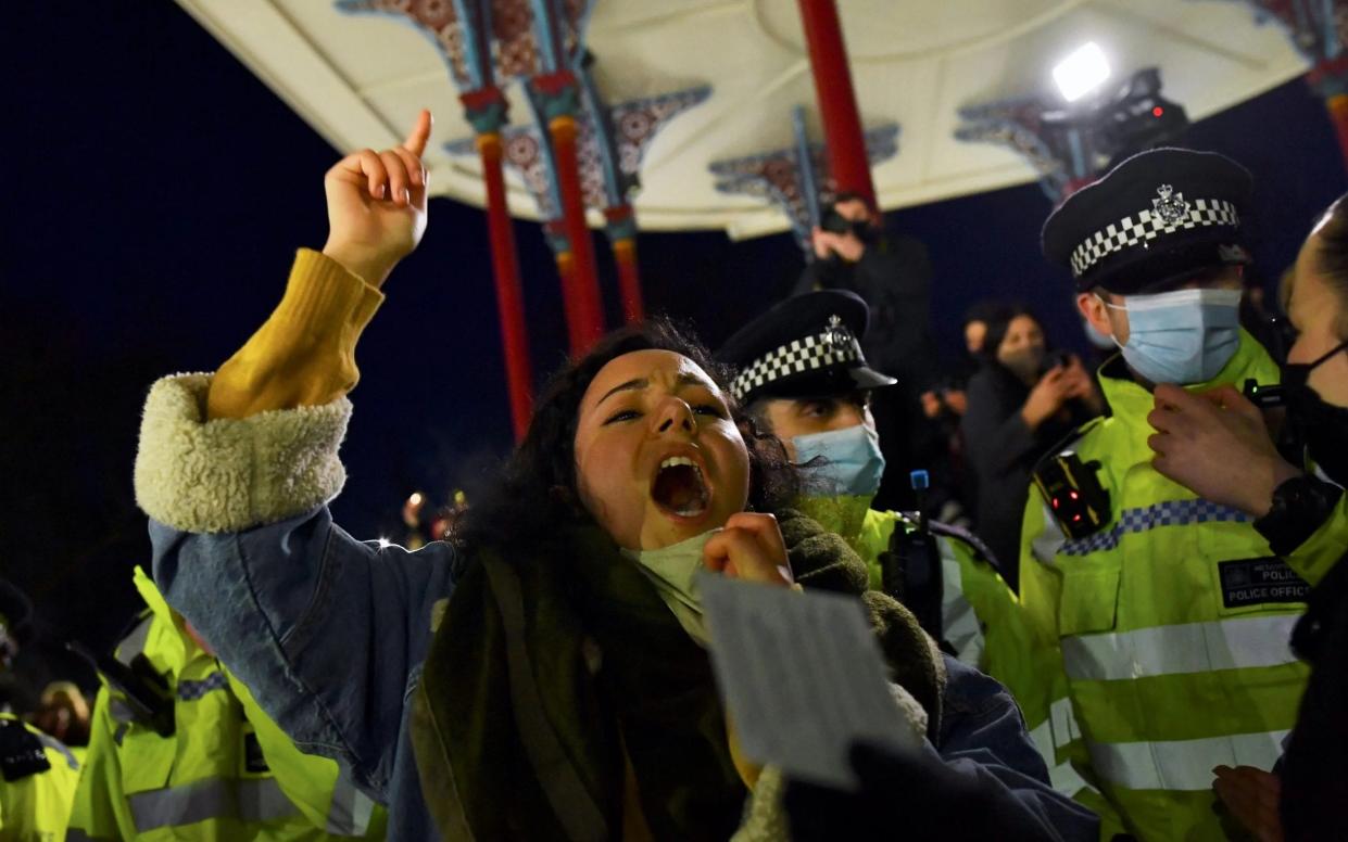 Dania Al-Obeid surrounded by police - Dylan Martinez/Reuters