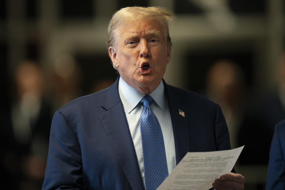 Former President Donald Trump speaks to reporters as he arrives for his trial at Manhattan Criminal Court, Thursday, May 9, 2024, in New York. (Steven Hirsch/New York Post via AP, Pool)