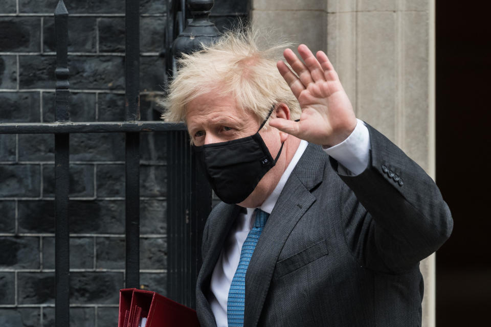 LONDON, UNITED KINGDOM - APRIL 28, 2021: British Prime Minister Boris Johnson leaves 10 Downing Street for PMQs at the House of Commons, on 28 April, 2021 in London, England. (Photo credit should read Wiktor Szymanowicz/Barcroft Media via Getty Images)