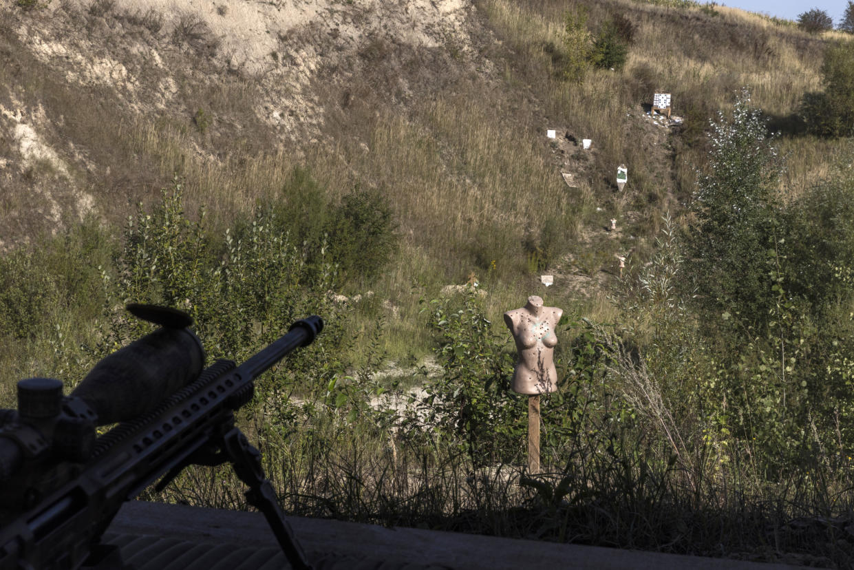 A bullet-riddled mannequin on shooting range used for sniper training in western Ukraine, Sept. 8, 2023. (David Guttenfelder/The New York Times)