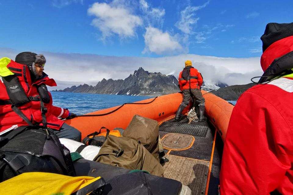 Researchers studying penguins in Antarctica