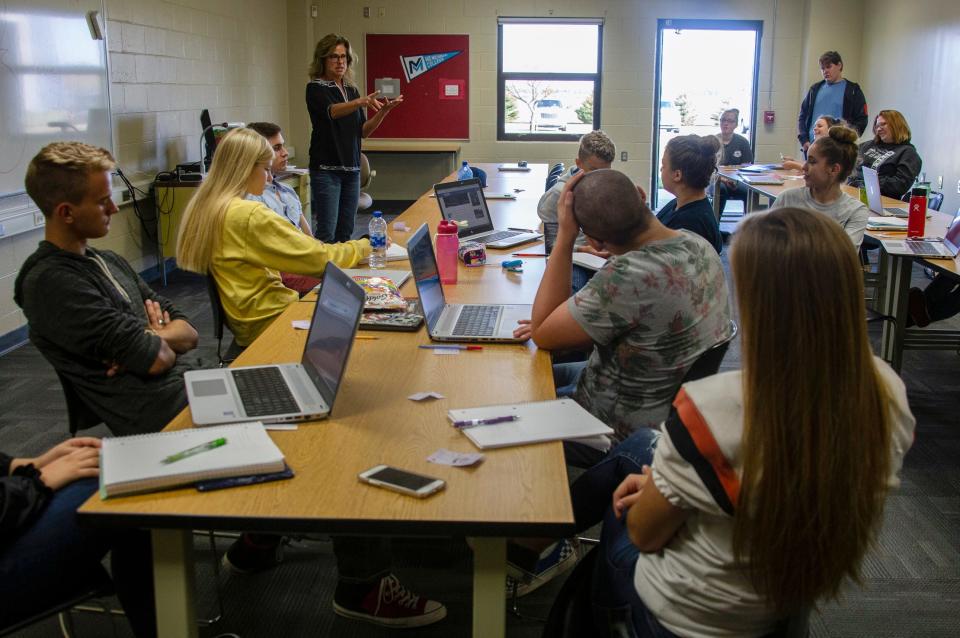 Julie Carr, an adjunct professor of speech from Mid-Michigan Community College, teaches at Huron Area Technical Center on Sept. 19, 2019, as part of a move to get higher education to areas without access to college.