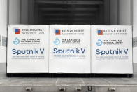 Boxes of Sputnik V vaccines are ready to be unloaded from a truck at a warehouse of Hungaropharma, a Hungarian pharmaceutical wholesale company, in Budapest, Hungary, Thursday, March 4, 2021. (Zoltan Mathe/MTI via AP)