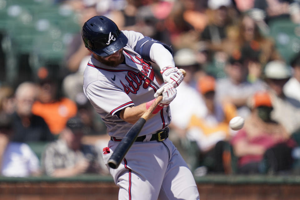 Atlanta Braves' Robbie Grossman hits an RBI single against the San Francisco Giants during the third inning of a baseball game in San Francisco, Wednesday, Sept. 14, 2022. (AP Photo/Godofredo A. Vásquez)