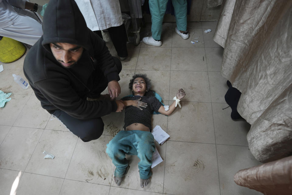 Palestinians wounded in the Israeli bombardment of the Gaza Strip are brought to Al Aqsa hospital in Deir al Balah, Gaza Strip, Friday, March 8, 2024. (AP Photo/Adel Hana)