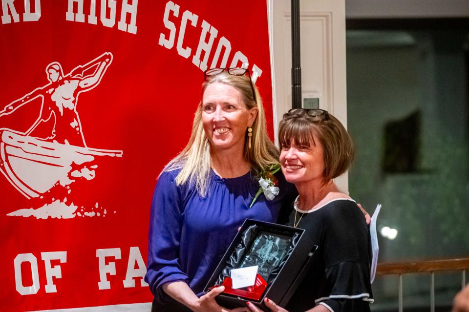 2024 New Bedford High School All Sport Hall of Fame Inductee Kara Tierney poses for a picture with Chris Greany.