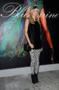 <b>Elena Santarelli</b> <br> Leggings en un animal print blanco y negro para Elena, quien eligió combinar su prenda con otras en negro, pero con un detalle: no le huyó al brillo. ¿Te gusta?