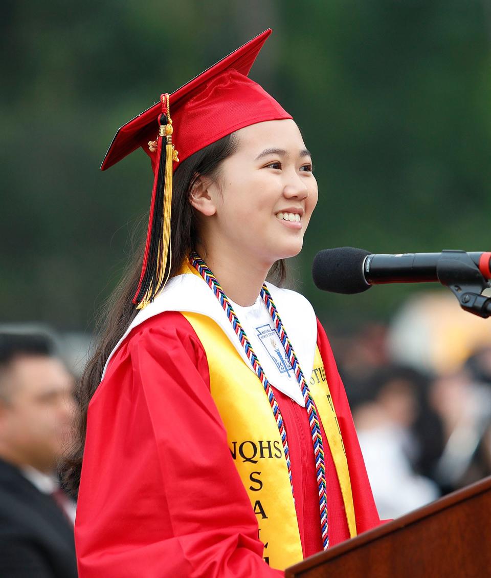 Salutatorian and Harvard-bound Kaitlyn Vu gives her graduation address during North Quincy High School's commencement ceremony at Veterans Memorial Stadium on Tuesday, June 6, 2023.