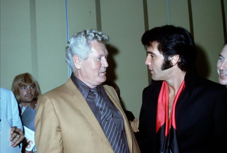 LAS VEGAS, NV - AUGUST 1: Rock and roll musician Elvis Presley & his father Vernon chat after a press conference after his first performance at the International Hotel on August 1, 1969 in Las vegas, Nevada . (Photo by Michael Ochs Archives/Getty Images)