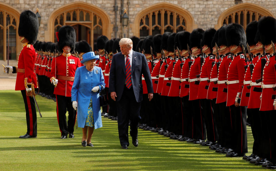 U.S. President Donald Trump and Britain's Queen Elizabeth inspect the Coldstream Guards during a visit to Windsor Castle in Windsor, Britain, July 13, 2018. REUTERS/Kevin Lamarque