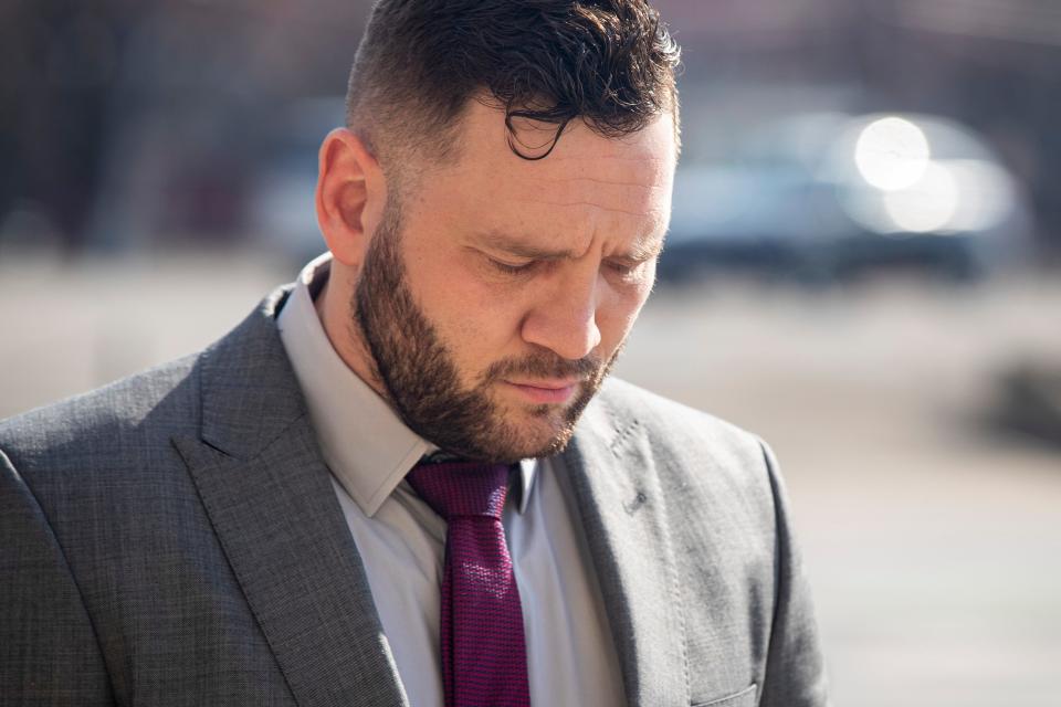 Former Louisville Metro Police officer, Cory Evans, walks into the Gene Snyder U.S. Courthouse on Tuesday for his sentencing after being federally charged with striking a protester during the Breonna Taylor demonstrations last May. Feb. 1, 2022