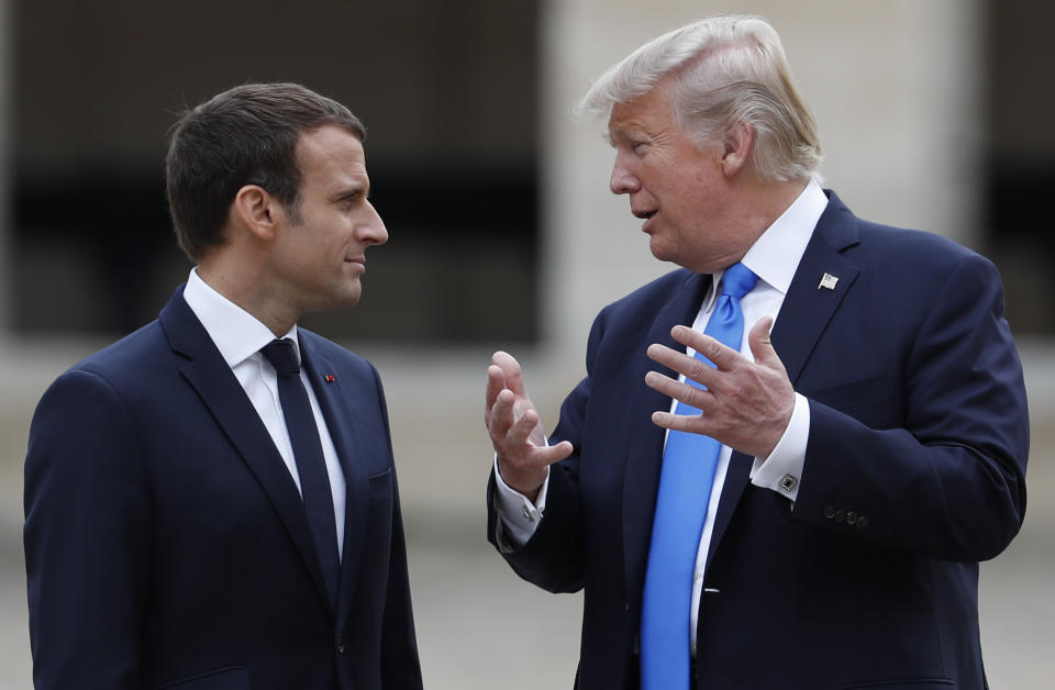 Macron and Trump talk during the welcome ceremony.&nbsp;