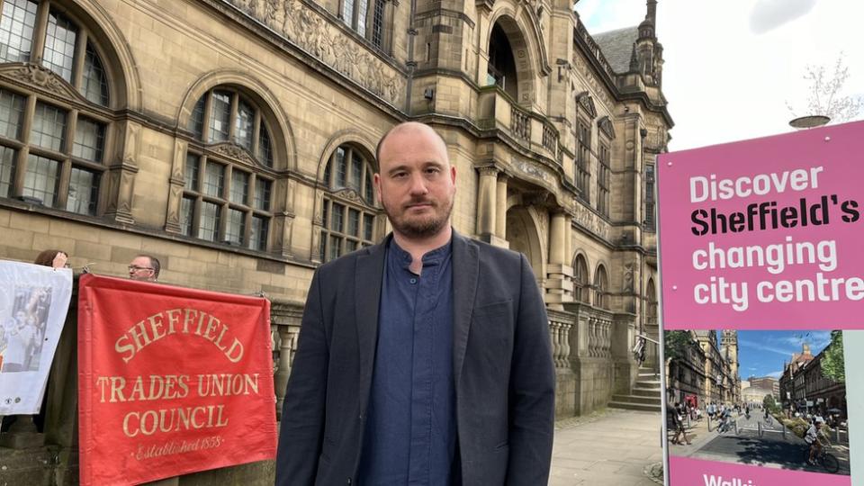 Sam Morecroft at the rally, outside Sheffield Town Hall