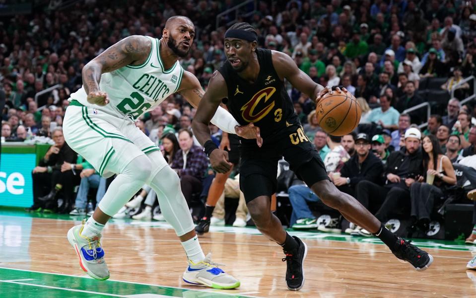 Cavaliers guard Caris LeVert drives against Celtics forward Xavier Tillman in the second quarter during Game 2 of the Eastern Conference semifinals, May 9, 2024, in Boston.