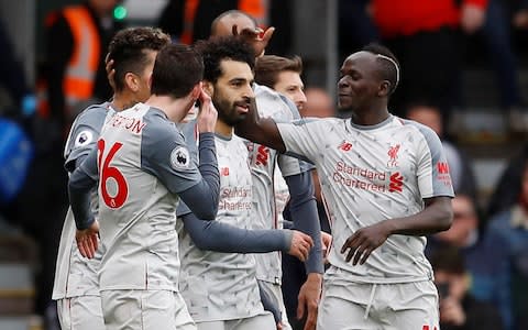 Liverpool's Mohamed Salah celebrates scoring their fourth goal with Sadio Mane and team mates - Credit: REUTERS