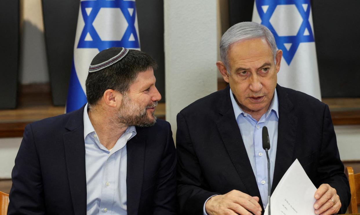 <span>Israeli PM, Benjamin Netanyahu (right), and finance minister, Bezalel Smotrich.</span><span>Photograph: Ronen Zvulun/Reuters</span>