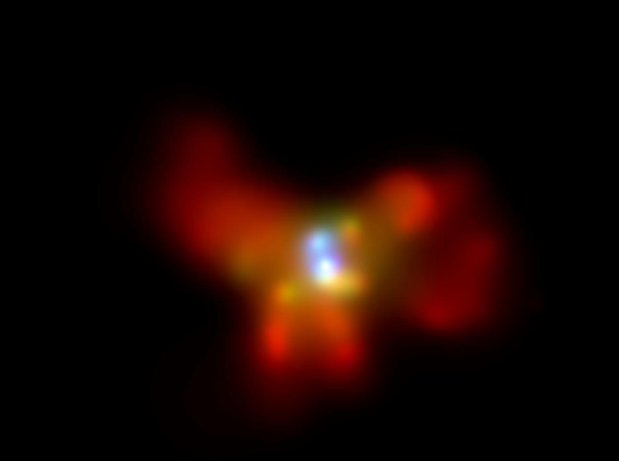 IN SPACE - NOVEMBER 19:  The galaxy NGC6240 is shown in this handout image from the NASA Chandra X-Ray observatory on November 19, 2002. The new x-ray observations of the galaxy have revealed two super-massive black holes at the center of the galaxy. The black holes will eventually merge in a cataclysmic event that will cause warps or gravitational waves in space.  (Photo by NASA/CXC/MPE/S.Komossa/Getty Images)