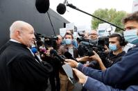 Supporters of activists gather at the District Court of West Lausanne