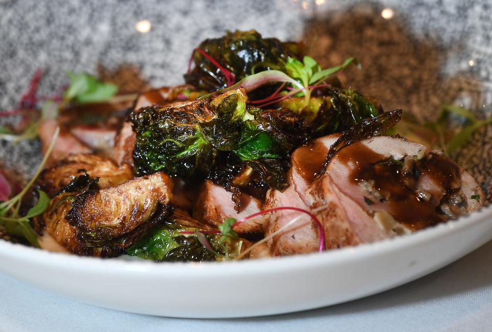 This is one of the dishes at Maestro's Bistro & Dinner Club in downtown Greenville. A dish of Mushroom & Blue Cheese stuffed pork tenderloin, with Rosemary Cauliflower, crispy Brussel sprouts finished with an Apricot glaze.