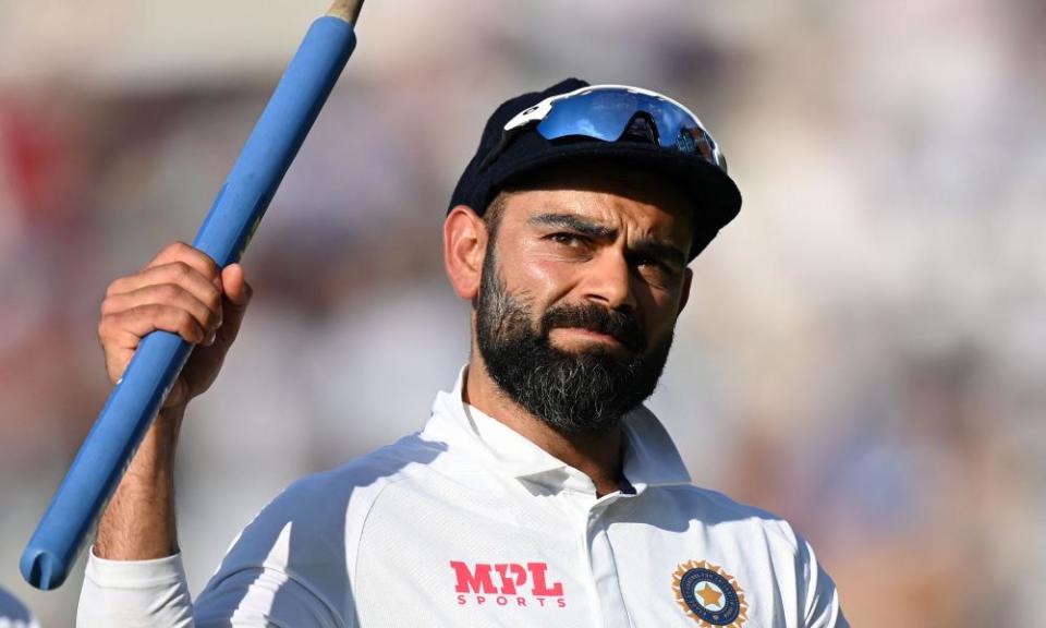 Virat Kohli celebrates with a stump after India beat England in the fourth Test at the Oval