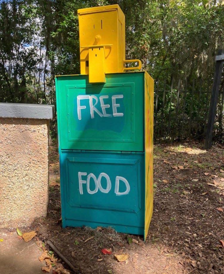Little Sunshine Pantries, on the GiveTLH nonprofits, repurposes newspaper stands as food giveaway stations, show here at CommonGrounds.