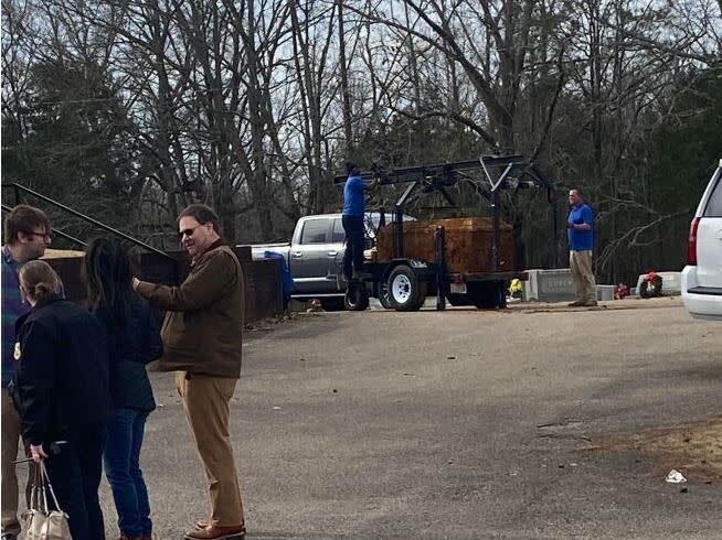 Crews were seen exhuming Pauline Pusser’s remains in Adamsville Cemetery on Thursday (submitted photo)