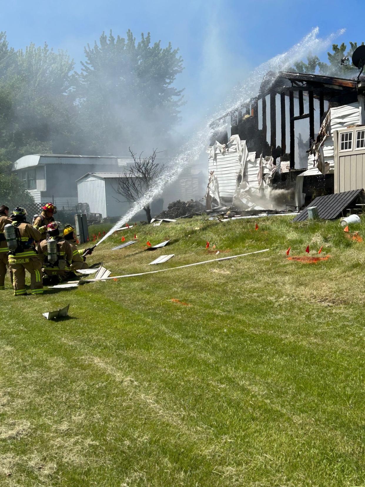 Firefighters battled a ferocious fire Friday, May 26, 2023, that had broken out in a Chesterfield home in the Carriage Way Trailer Park. A ruptured gas line caused an explosion, which then started the blaze.