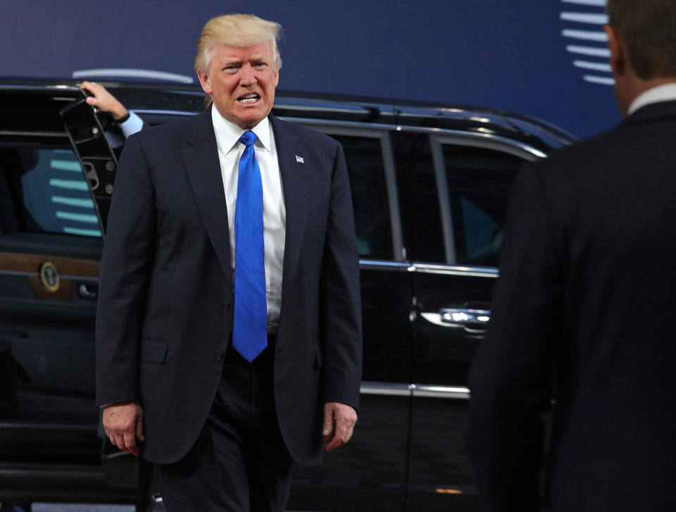 <p>President Donald Trump grimaces as he is greeted by European Council President Donald Tusk, right, as he arrives at the Europa building in Brussels on Thursday, May 25, 2017. US President Donald Trump arrived in Belgium Wednesday evening and will attend a NATO summit as well as meet EU and Belgian officials. (AP Photo/Olivier Matthys) </p>