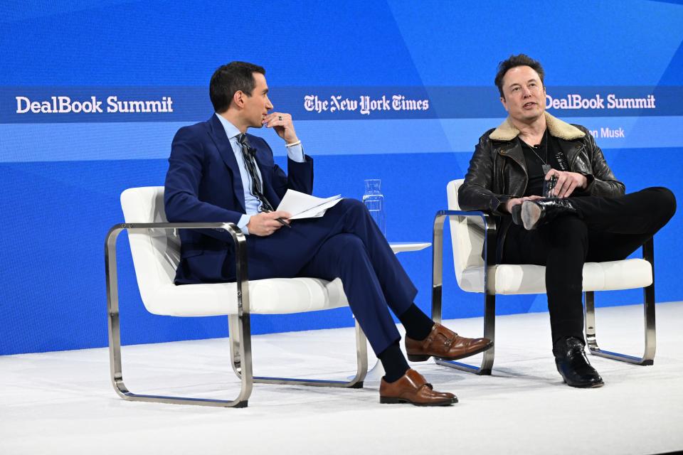 Andrew Ross Sorkin, left, and Elon Musk speak onstage during The New York Times Dealbook Summit 2023 at Jazz at Lincoln Center on Nov. 29, 2023, in New York City.