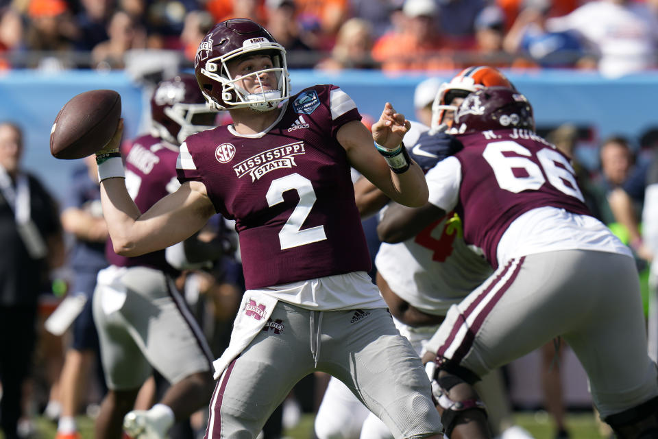 Mississippi State quarterback Will Rogers (2) throws a pass against Illinois during the first half of the ReliaQuest Bowl NCAA college football game Monday, Jan. 2, 2023, in Tampa, Fla. (AP Photo/Chris O'Meara)