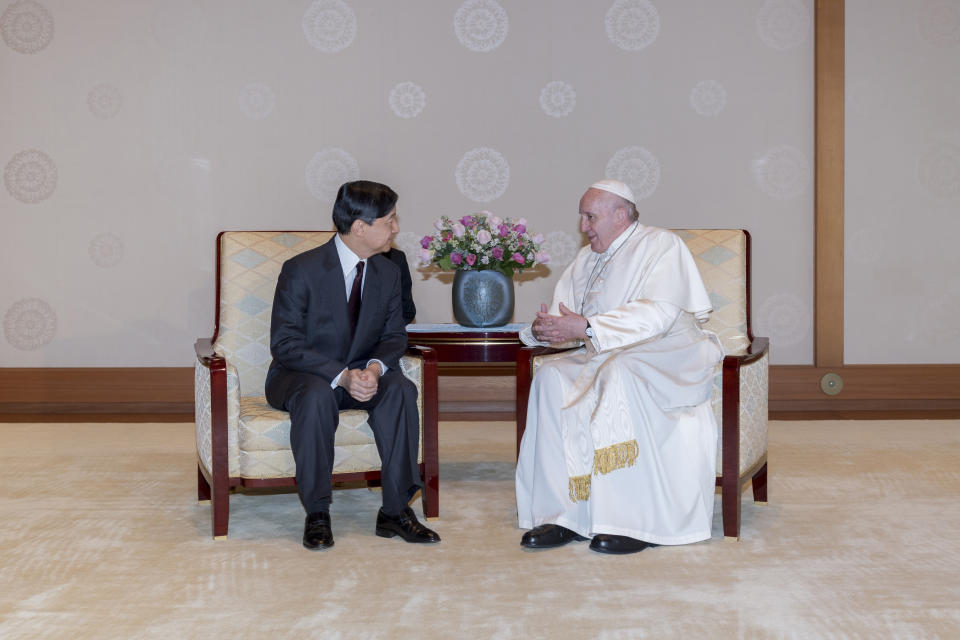In this photo provided by the Imperial Household Agency of Japan, Pope Francis, right, talks with Japan's Emperor Naruhito at the Imperial Palace in Tokyo, Monday, Nov. 25, 2019. (The Imperial Household Agency of Japan via AP)