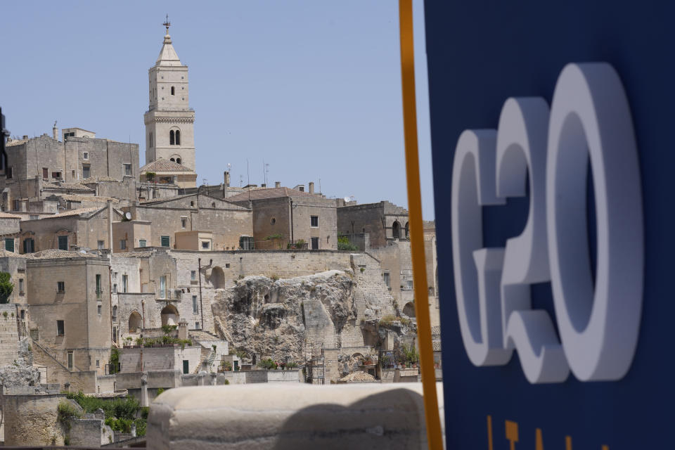 A view of Matera, Italy, where a G20 foreign affairs ministers' meeting is taking place Tuesday, June 29, 2021. For decades, visually stunning Matera, a provincial capital of Basilicata, one of Italy’s poorest regions, had been synonymous with southern European poverty and underdevelopment. Matera’s famous "Sassi" — literally stones — were dwellings carved out of natural caves of tuff. In recent years, the “Sassi” have been increasingly converted into boutique hotels, restaurants and getaway homes for the affluent, eager to be inspired by dramatic views from the city, which towers over a torrent. (AP Photo/Antonio Calanni)