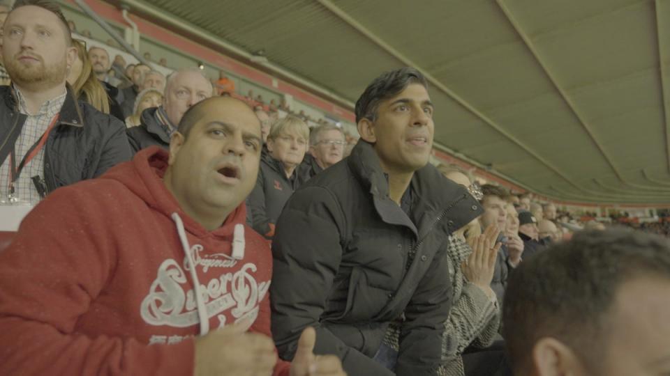 Rishi Sunak and his cousin Karan Kapoor at St Mary's Football Stadium, Southampton (ITV)