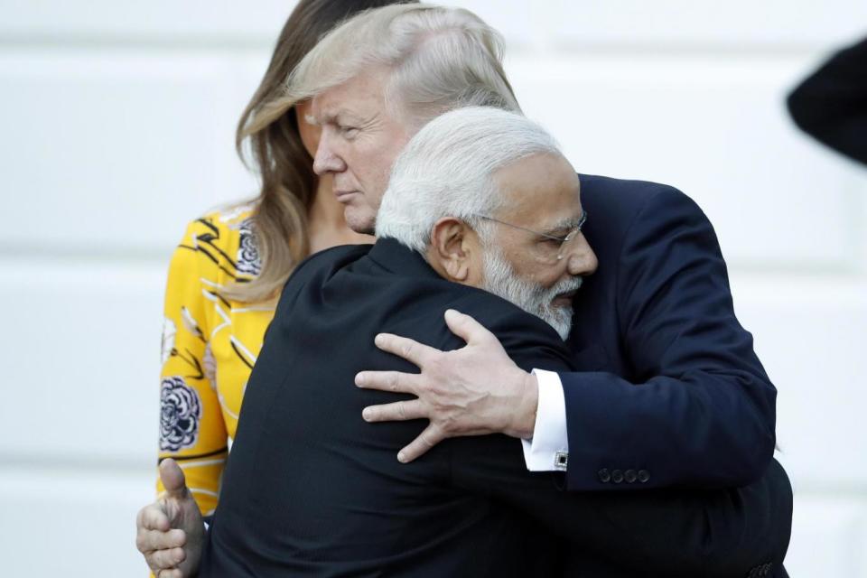 Bear hug: Indian PM Narendra Modi greeting President Trump at the White House. (AP)