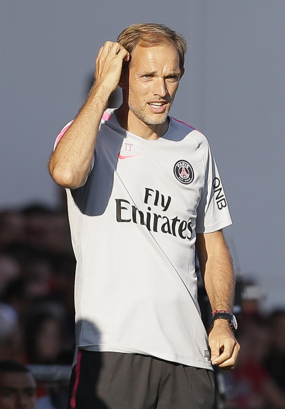 PSG's coach Thomas Tuchel reacts during their League One soccer match between Nimes and Paris Saint-Germain at Jean-Bouin stadium in Nimes, southern France, Saturday Sept. 1, 2018. (AP Photo/Claude Paris)