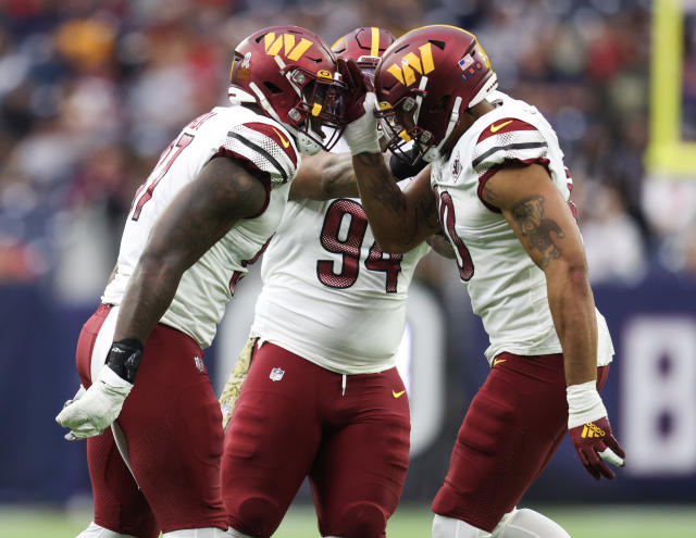 Washington Commanders defensive end Efe Obada (97) runs during an