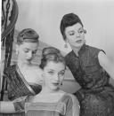 <p>There are so many different variations of a chignon, but in the late '50s an artfully pinned-up version is what all the stylish women were wearing to dinner parties.</p>