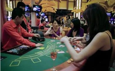 In its latest annual report, the Samaritans of Singapore noted a sharp increase in number of calls seeking counselling on loan shark and gambling issues. (Reuters photo)