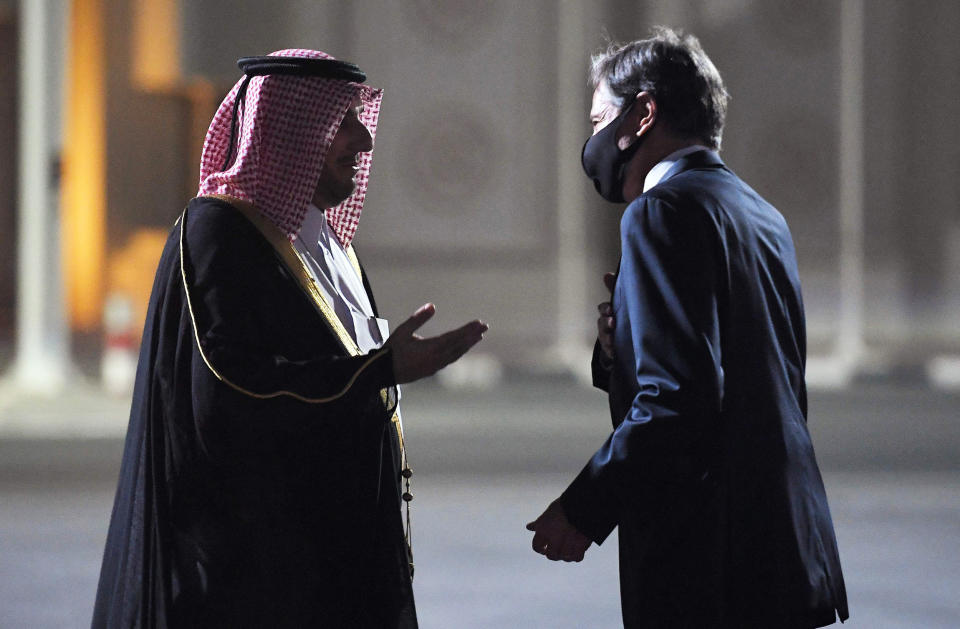 Secretary of State Antony Blinken is welcomed upon his arrival by MFA Director of Protocol Ambassador Ibrahim Fakhroo at Old Doha Airport in Qatar's capital on Sept. 6, 2021. (Olivier Douliery / AFP - Getty Images)