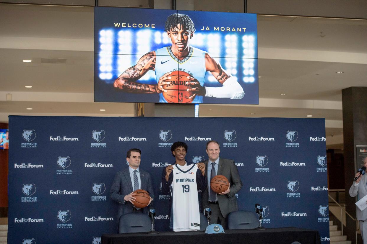 June 21, 2019 - Memphis Grizzlies guard Ja Morant (center) poses for a photo with executive vice president of basketball operations Zach Kleiman (left) and head coach Taylor Jenkins during a press conference at FedExForum. The Grizzlies chose Morant with the second overall pick in the 2019 NBA Draft.