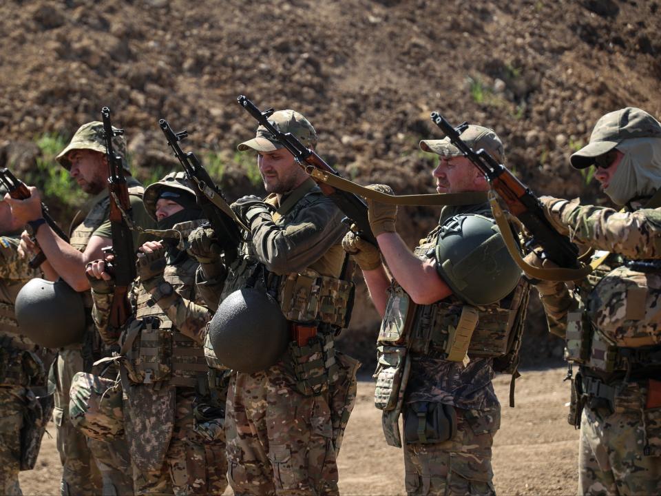 Recruits of the Offensive Guard assault brigade attend a combat training in Kharkiv (REUTERS)