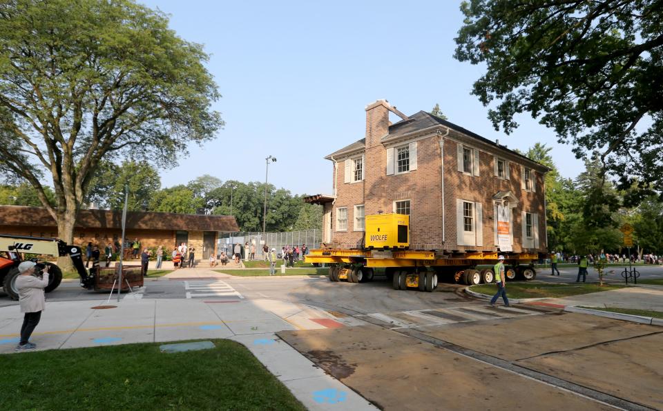 Workers begin moving the May house Thursday from Park Lane to its new location at 919 Riverside Drive in South Bend. The house is making its way onto Lafayette Boulevard from Park Lane.