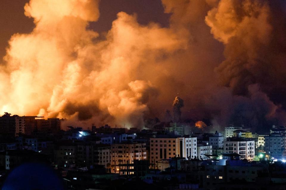 Flames and smoke billow during Israeli strikes in Gaza on Monday. Markets have reacted since the Hamas attack on Israel, but the full extent of economic impact is not yet clear. (Mohammed Salem/Reuters - image credit)