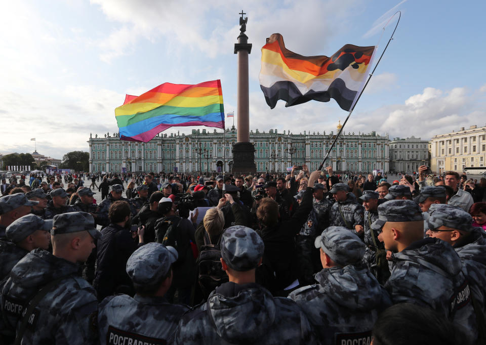 Law enforcement officers block participants of the LGBT community rally 