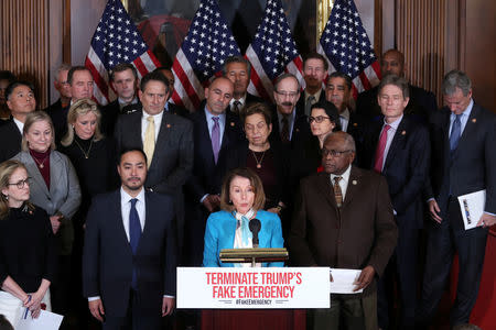 U.S. House Speaker Nancy Pelosi (D-CA), flanked by Representative Joaquin Castro (D-TX) (L) and House Democrats hold a news conference about their proposed resolution to terminate U.S. President Trump's Emergency Declaration on the southern border with Mexico, at the U.S. Capitol in Washington, U.S. February 25, 2019. REUTERS/Jonathan Ernst