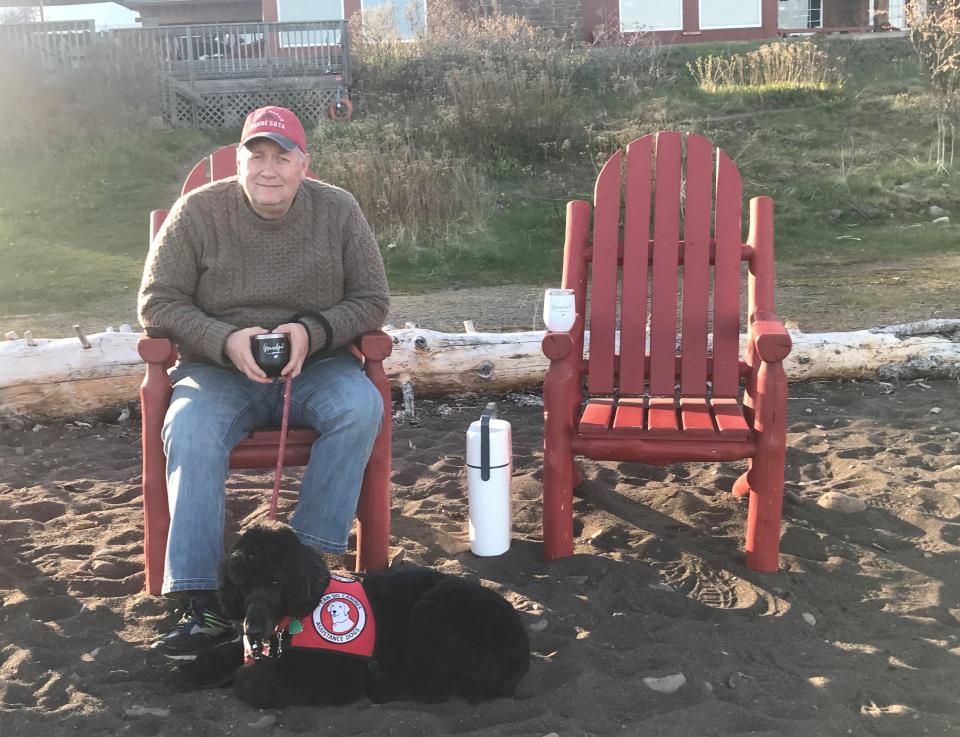 Marty Lukaszewski, a South Bend native now living in New Hope, Minn., relies on his service dog Laverne daily to deal with Parkinson's disease.