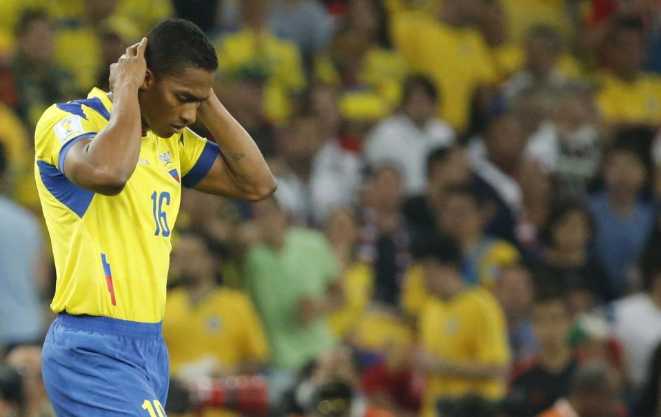Ecuador's Antonio Valencia reacts as he walks off the field after receiving a red card from referee Noumandiez Doue of Ivory Coast during their 2014 World Cup Group E soccer match against France at the Maracana stadium in Rio de Janeiro June 25, 2014. REUTERS/Sergio Moraes (BRAZIL - Tags: SOCCER SPORT WORLD CUP)