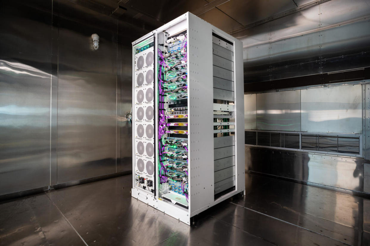 A custom-built rack for the Maia 100 AI Accelerator and its “sidekick” inside a thermal chamber at a Microsoft lab in Redmond, Wash. (John Brecher for Microsoft)